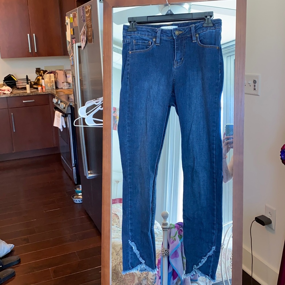 Blue jeans with frill design at bottom